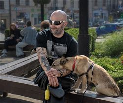 С другом.